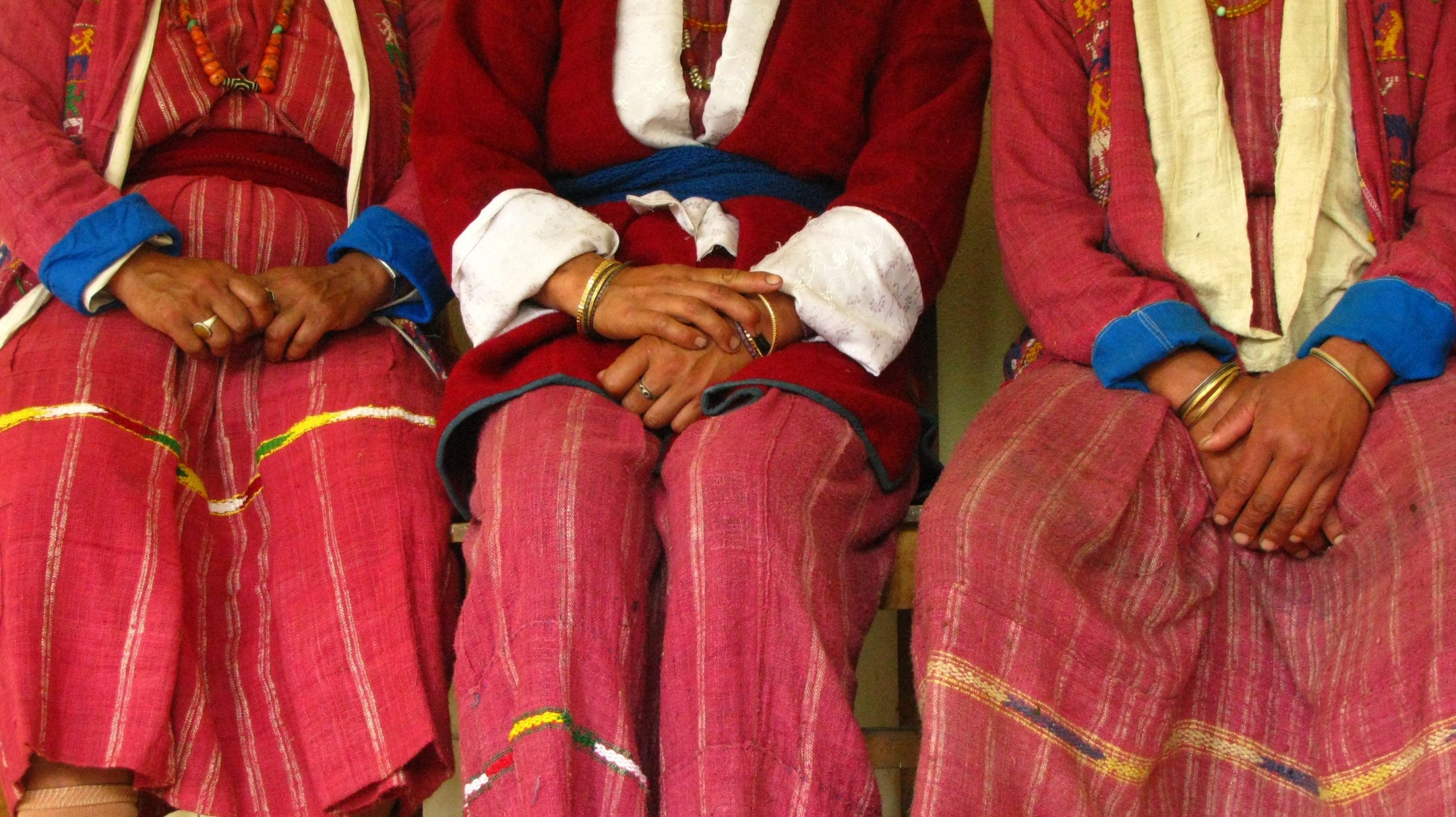 Singers' hands after a recording session in Zimithang Village